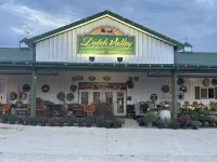 White cabin in the woods close to Univ. of Central Missouri and Whiteman AF Base