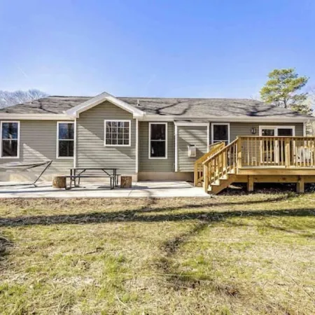 Modern Waterfront Home with Kayak, Firepit, Gameroom, Pool+Beaches, Dog & EV OK