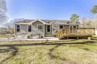 Modern Waterfront Home with Kayak, Firepit, Gameroom, Pool+Beaches, Dog & EV OK