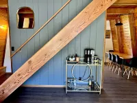 Plug in to the peace, joy, and Zen at this modern Modified A-Frame Cabin!