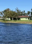 beautiful home on a 3 acre lake with security