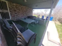 Waterfront with Boat Dock on Detroit River Channel. Fish from the Backyard