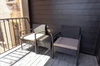 Cozy Downtown Loft: 2BR condo w/ AC, WiFi, Balcony & Free 2-car parking.