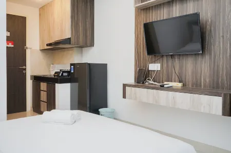 Nice and Comfy Studio at Serpong Garden Apartment Отели в г. Cisauk
