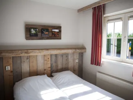 Bungalow in Netherlands with Garden Terrace Отели в г. Барневелд