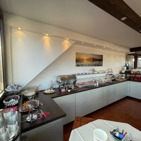 Aparthotel Kleine Perle Отели в г. Куксхафен