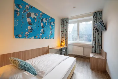 Hotel Madeleine Biohotel Отели рядом с достопримечательностью «Университет Саара»