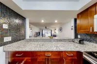 Condo across the street from the beach with pool, tennis,  washer/dryer