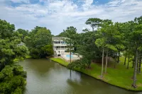 Waterfront Retreat with Private Pool and Game Room - Spectacular Escape