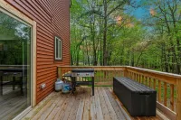Lake Access and Expansive Deck - Charming Retreat with Cozy Fireplace