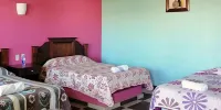 Villa Jardines - Family Room, Multiple Beds