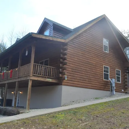 Secluded cozy cabin nestled among the hemlocks and rock formations in Hocking