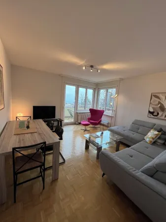 Large penthouse apartment with lake view Отели в г. Нёвшатель