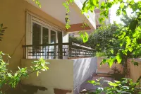 The villa has 3 bedrooms,3 bathrooms,a dining area, and a patio with garden view