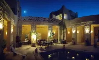In Medina, near the battlements. Palais des Sables with heated pool, staff, and garden