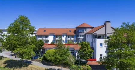 Hotel Landhaus Feckl Отели в г. Айдлинген