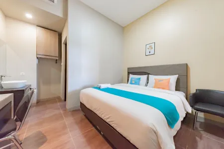 Sans Hotel Berau Square Отели рядом с достопримечательностью «Парагола Батумианг»