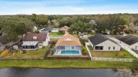 Escape to Florida Luxury – Lake View Pool Home in Lutz!