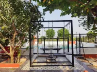 Idyllic Getaway Amidst Guava And Mango Trees