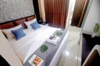 Modern and Tiny Studio at Tamansari Papilio Apartment By Travelio