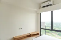 Serene and Modern 2BR Sky House BSD Apartment near AEON By Travelio