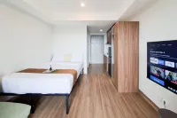 Homey and Minimalist Studio Apartment at Anwa Residence By Travelio
