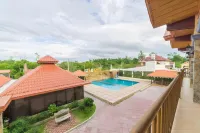 RedDoorz Plus @ Starhomes Olivianville - piscina
