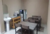 Style50 Homestay Hotels near حديقة حيوان سورابايا