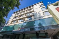 Kandi Tree Hotel Hoteles cerca de Art of Living International Center