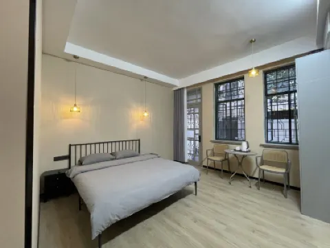 Houmujia Apartment (Shanghai Ruijin Hospital Branch) โรงแรมใกล้สวนฟักซิ่ง