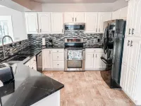 Your Conneaut Lake Getaway: Comfy 3Br Duplex, Hot Tub, Fenced Yard!