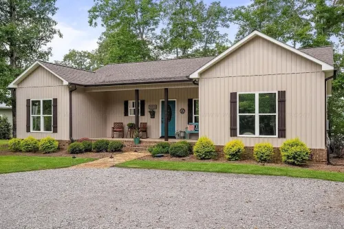 Cozy lakefront home with beautiful views, fire pit & private dock.