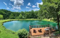 Enjoy Fall Serenity on Our Woodland Retreat with Boat Parking Near Truman Lake Hotels in Henry County