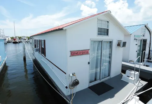 Waterfront Sunset View Aqua Villa at Conch Shell @ Mangrove Resort LLC