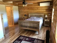 Private Log Cabin with breathtaking views on 15 acres adjacent to forest service