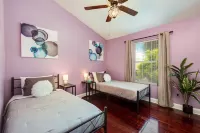 Luxury 5 Bedroom Dunedin home ~ TWO full kitchens, heated pool, hot tub!