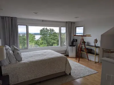 Enjoy elegant comfort with breathtaking water views on grand property