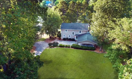 Lakefront Luxe Retreat in Tranquil Cove  Endless Enjoyment  Lakeside Fireplace