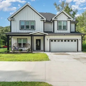 Luxurious 5-bedroom house with swim-spa, fitness&weight room, game room, & more!