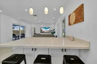 Beauty and the Beach Vacation House|Backyard w/ Heated Pool +Games