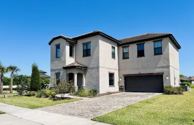 New two story home w/large private pool, patio, BBQ area & game room. Hotels near Haines City Theatre