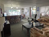 Vacation Stay at Hubbard Lake Air-Conditioned Lakefront Mobile Home