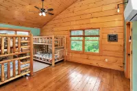 Gorgeous custom log cabin on 185 acres