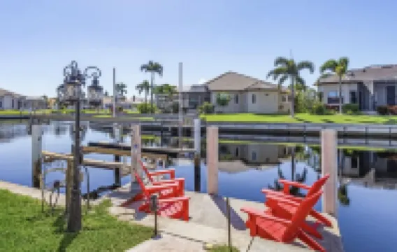 LOCATION!! Modern waterfront home;1-block to FishermanVillage; HEATED SALT POOL