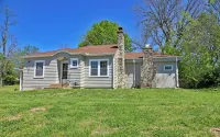 Charming 2-bedroom cottage in scenic Southwest MO with a large corner lot.