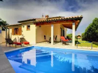Detached Modern Villa with Pool and Fenced Yard Near the Sea