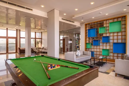 Dhara Residence E2 Lodge Hotel Отели рядом с достопримечательностью «Университет Октобер 6»