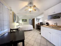 Cozy Poolside Cottage with Tropical Gardens - Charming Island Retreat