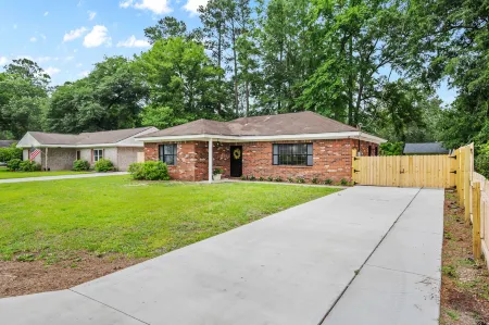 Charming Backyard Oasis and Cozy Home Theater - Delightful Retreat