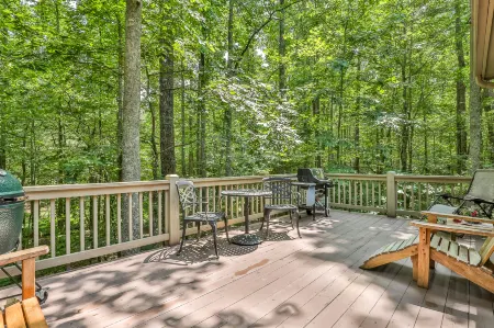 Charming Cabin with Creek and Scenic Deck - Stylish Escape